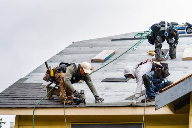 Professional Roofing technician working in Portland, CT